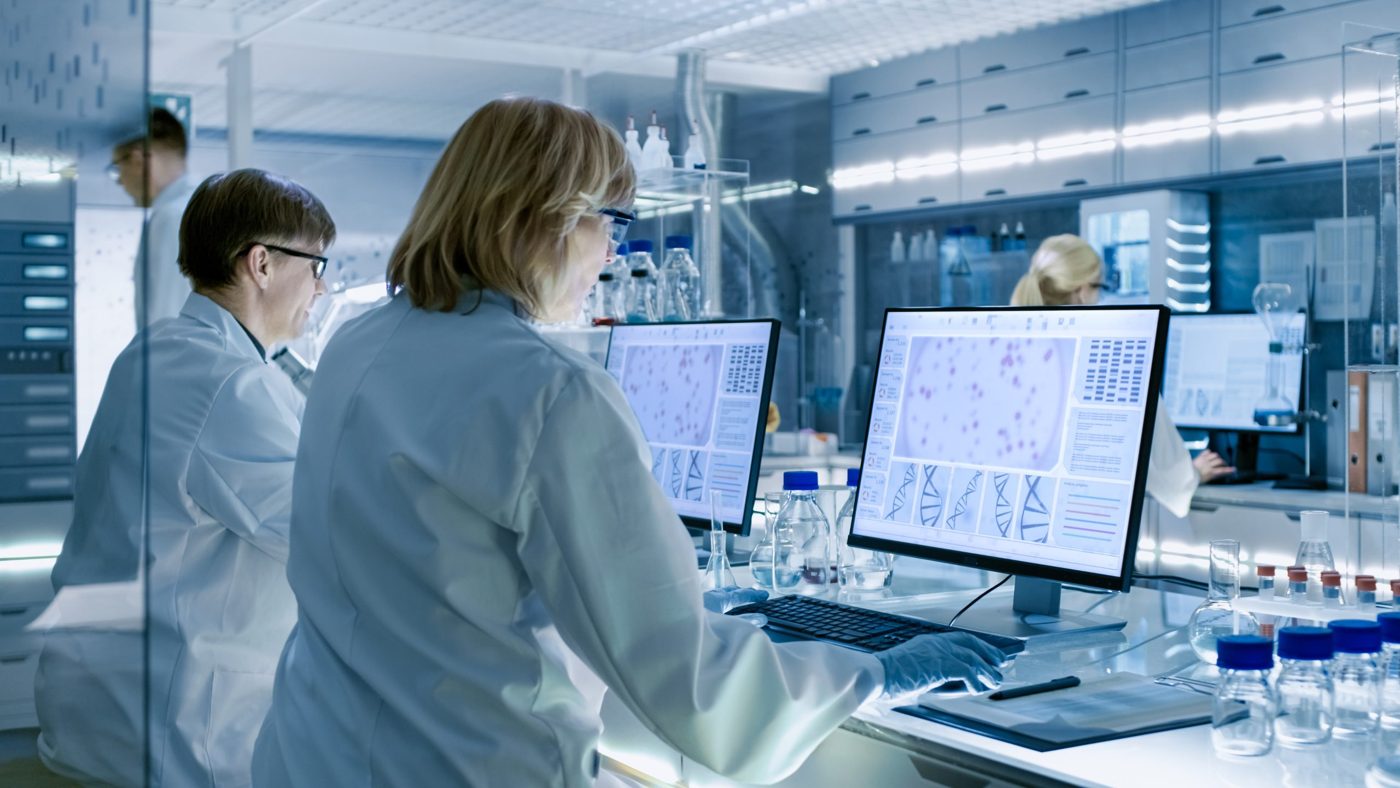 Researchers working in a canine health laboratory